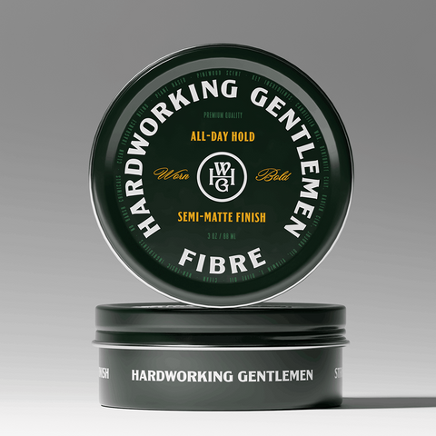 Hardworking Gentlemen clay product packaging on a gray background