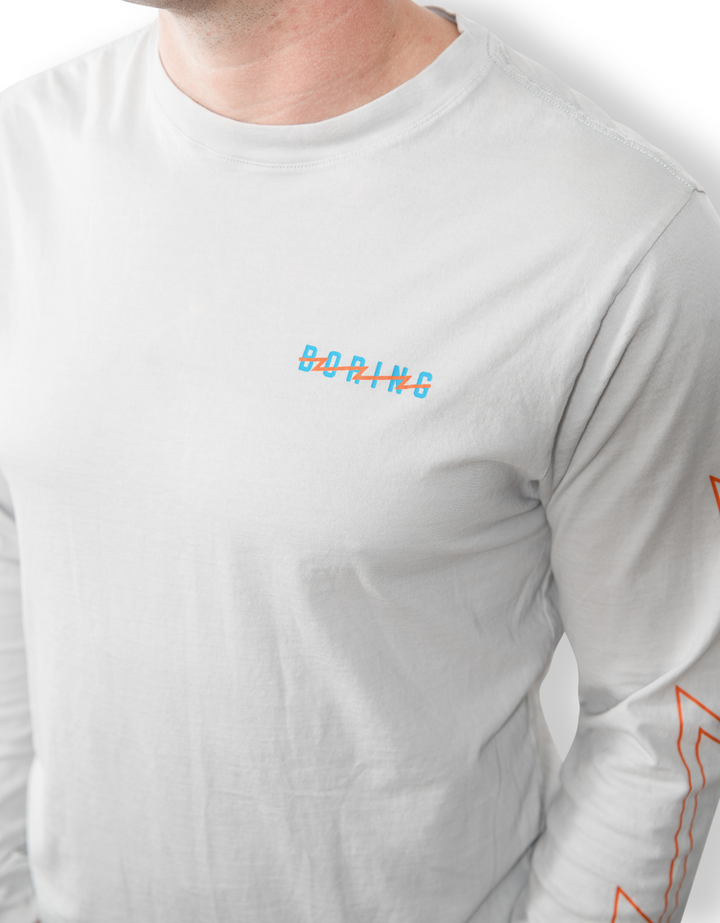 A JOLT TO BORING - ŠALTA LONG SLEEVE GRAPHIC T-SHIRT by Bajallama