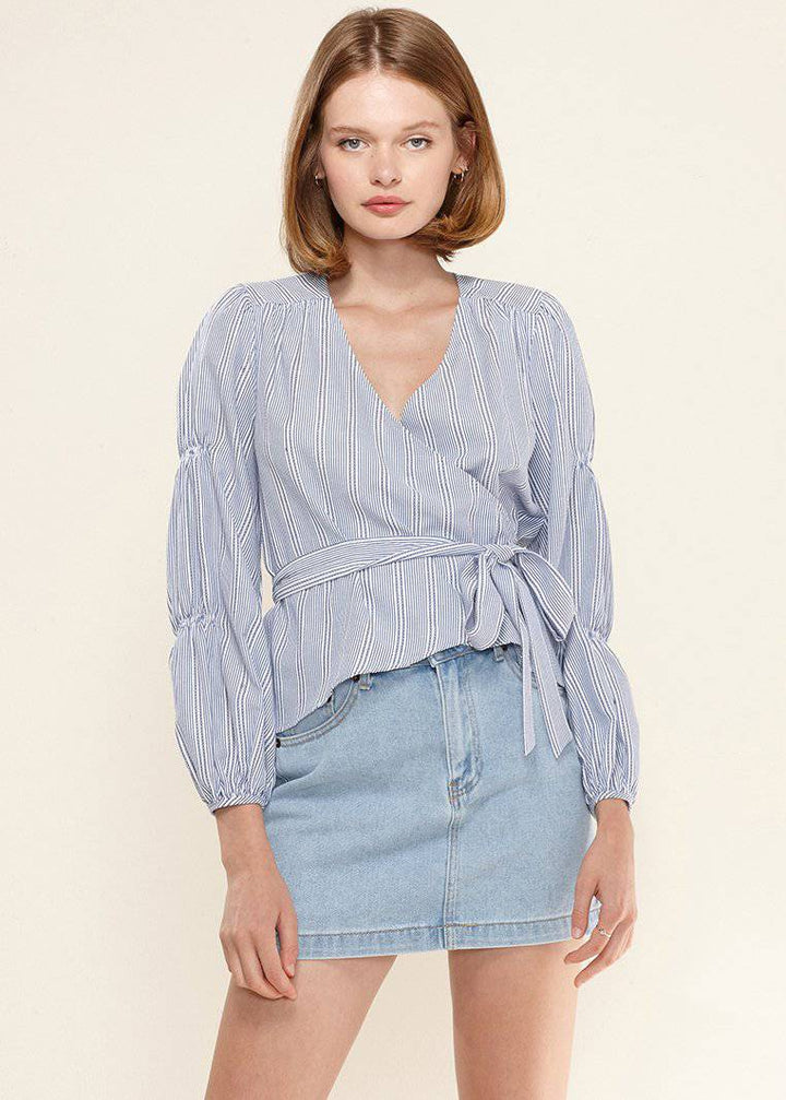 Smocked Sleeve Stripe Wrap Blouse in Blue by Shop at Konus