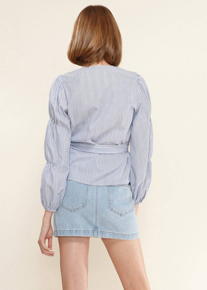 Smocked Sleeve Stripe Wrap Blouse in Blue by Shop at Konus