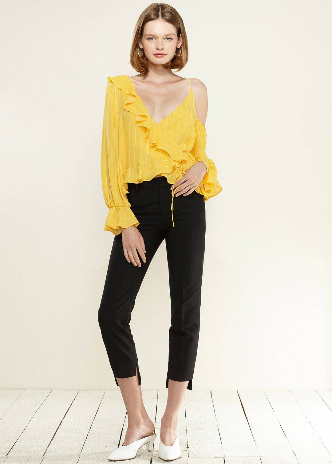 Women's Asymmetrical Shoulder Ruffle Blouse in Yellow by Shop at Konus