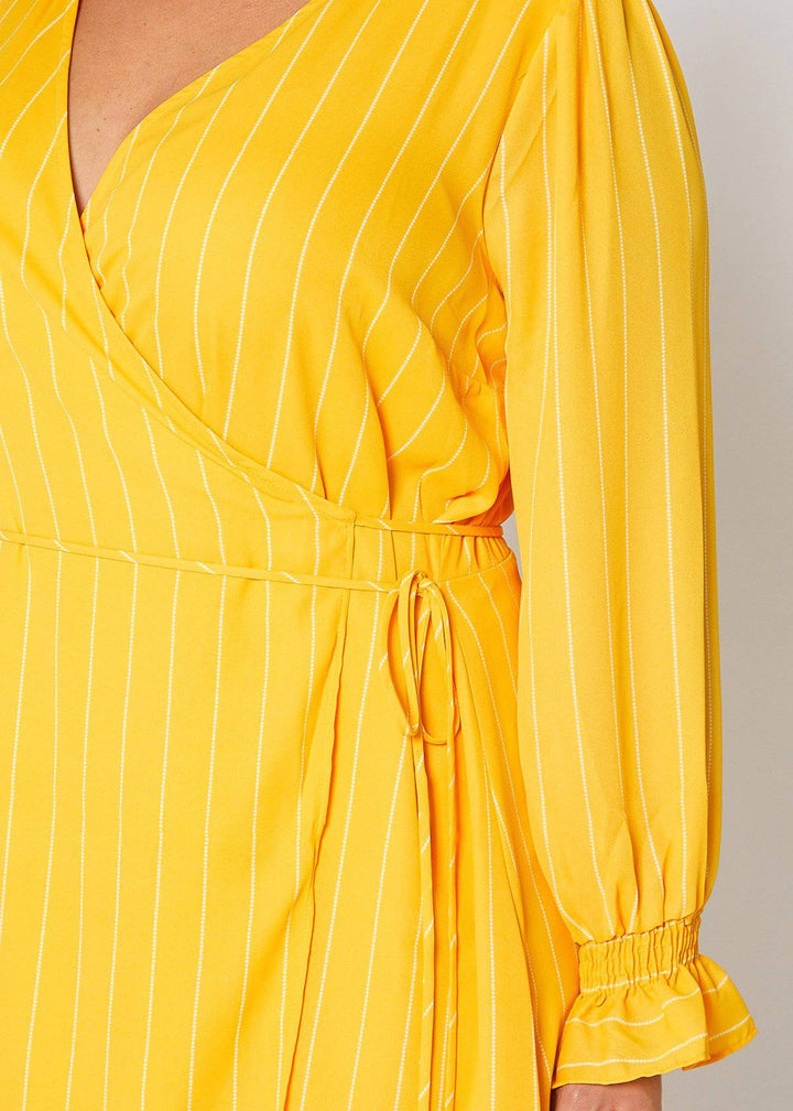 Plus Size Smocked Bell Sleeve Wrap Dress in Yellow by Shop at Konus