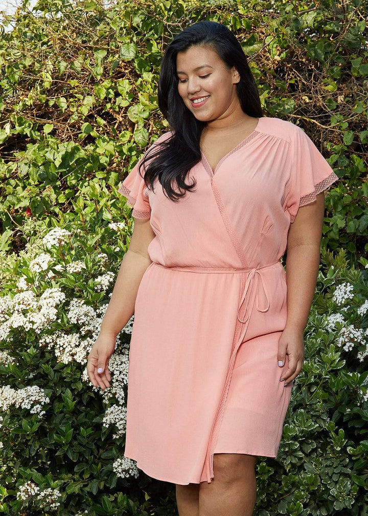 Plus Size Lace Trim Wrap Dress in Coral by Shop at Konus