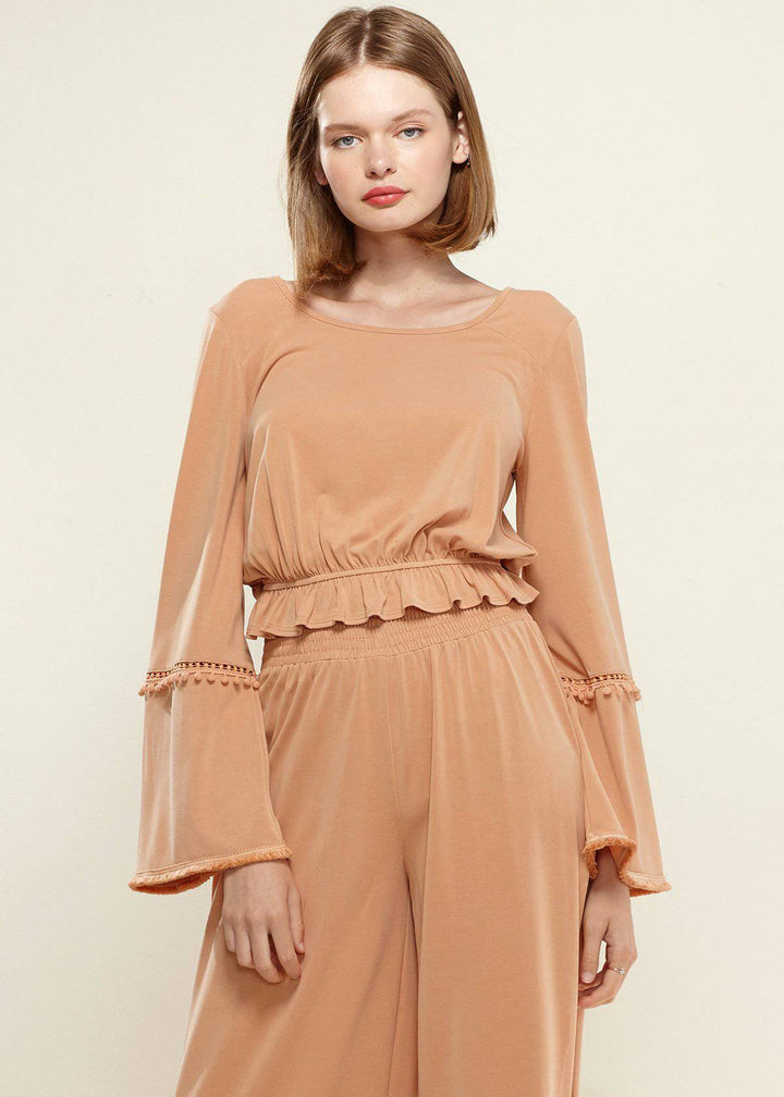 Women's Fringe Cuff Bell Sleeve Top in Apricot by Shop at Konus