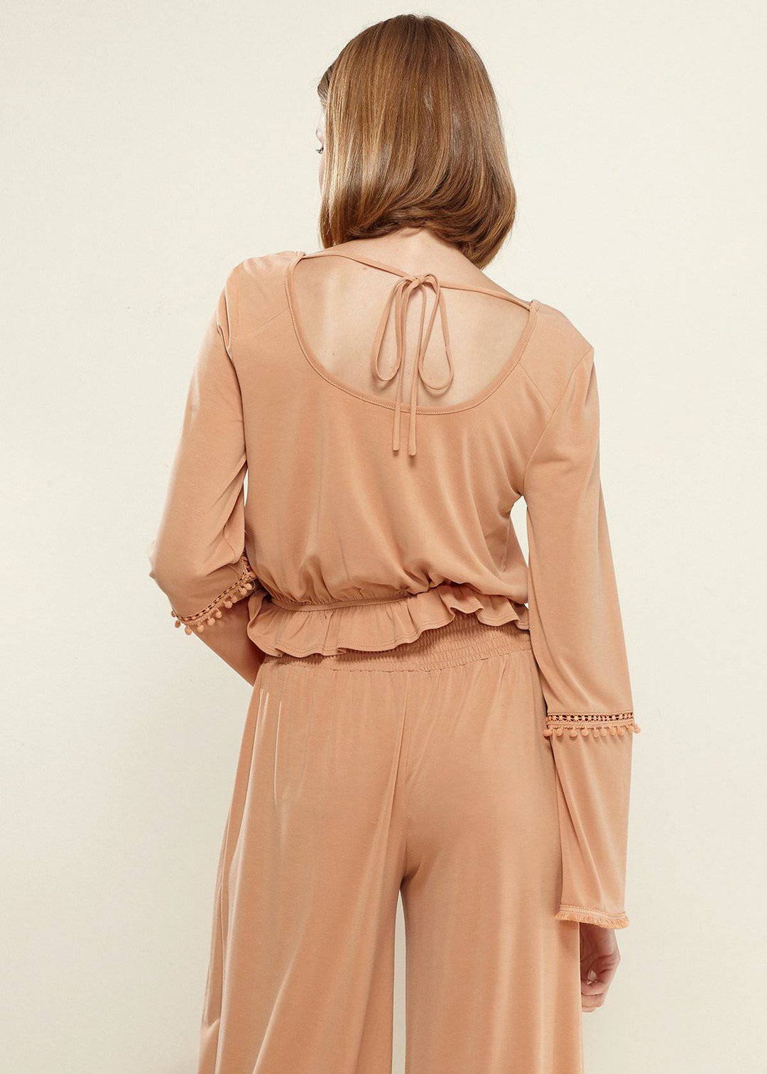 Women's Fringe Cuff Bell Sleeve Top in Apricot by Shop at Konus