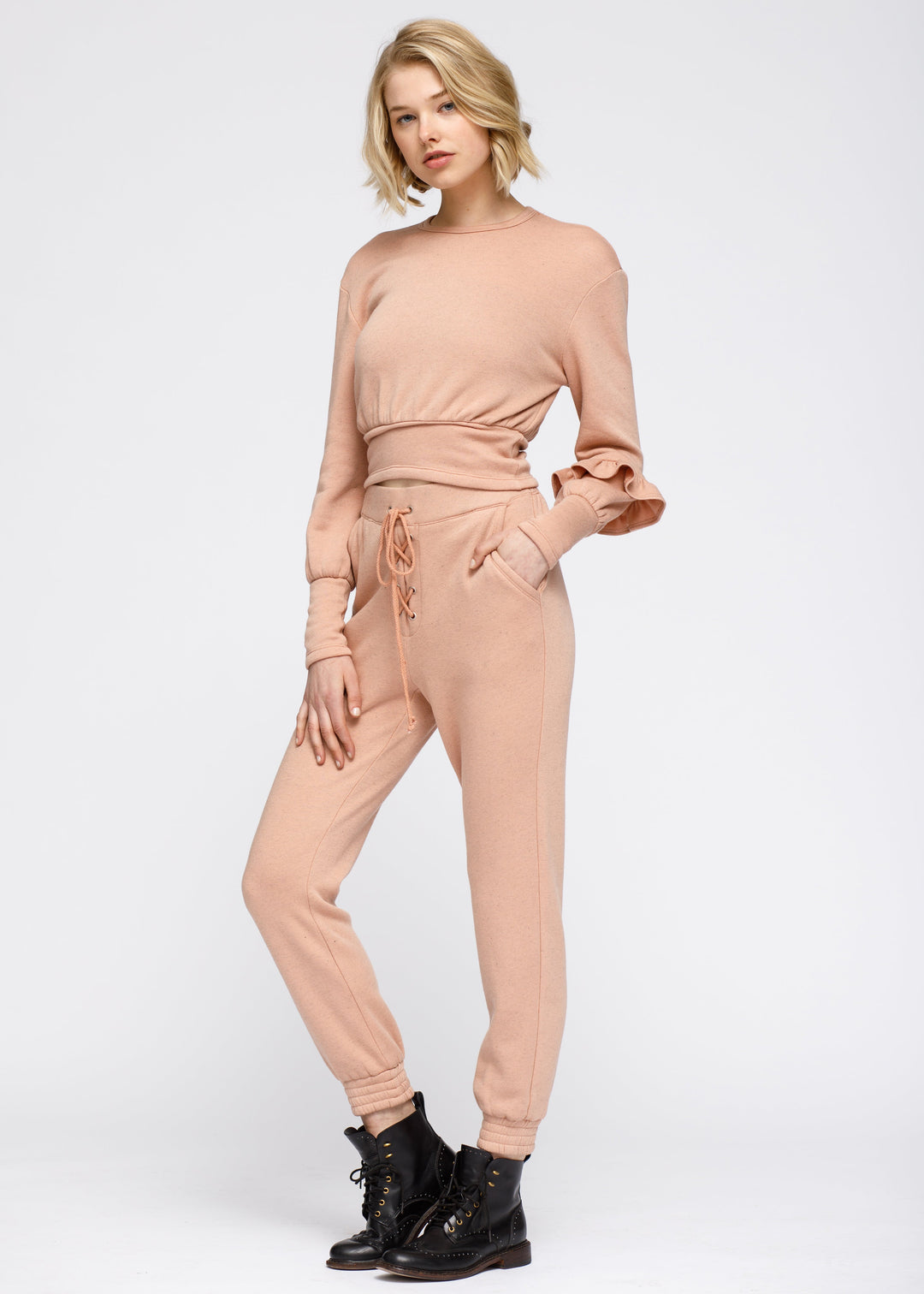 Crewneck Ruffle Sleeve Peplum Sweatshirt In Peach by Shop at Konus