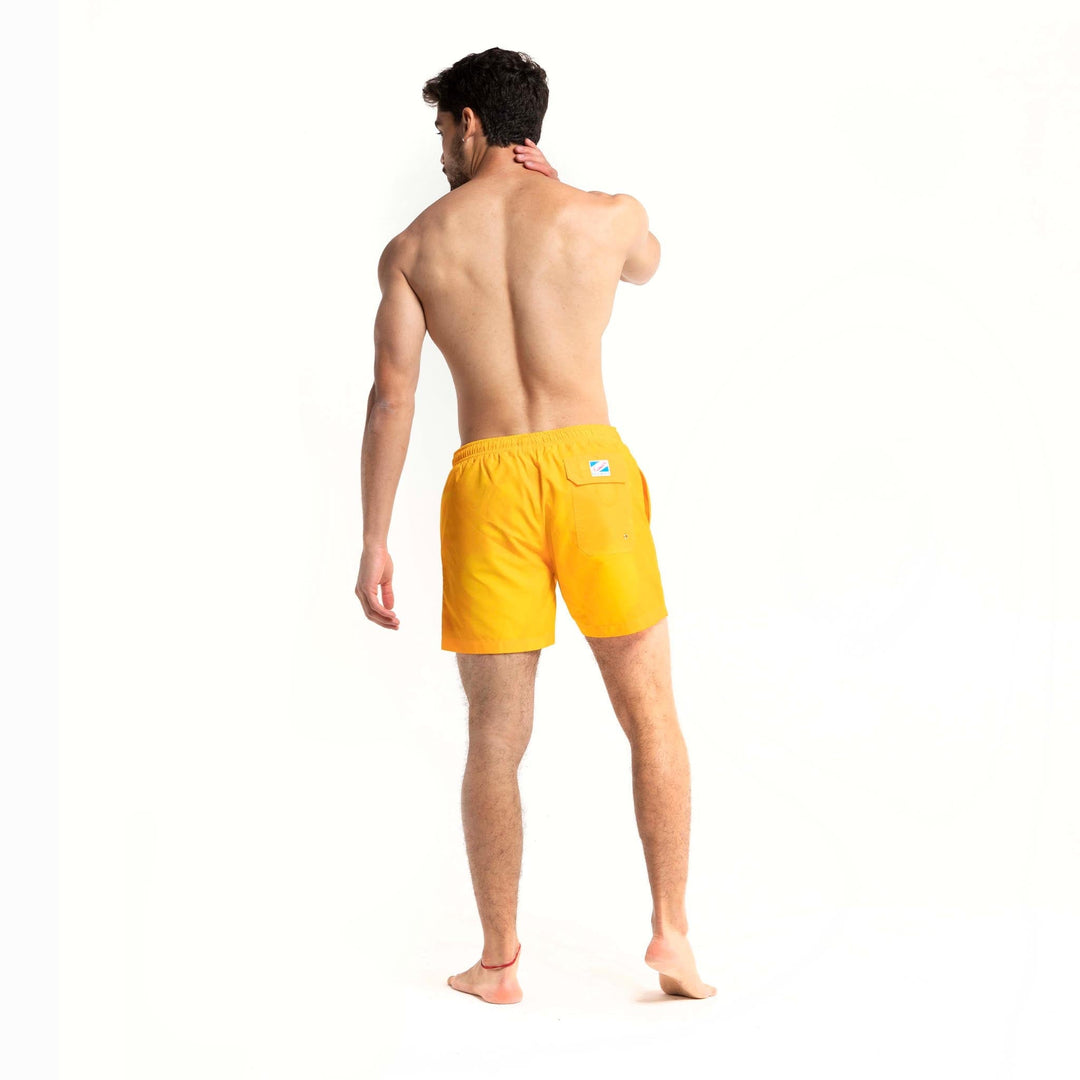 Yellow to Orange - 5" Swim Trunks + Color Changing by Bermies Swimwear